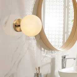 Applique murale moderne, globe transparent douille dorée SIERRE