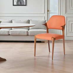 Chaise en cuir rouille design, accoudoirs bois brun ALDER