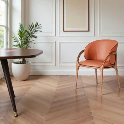 Chaise en cuir terracotta dos rond accoudoirs bois noir ALDER
