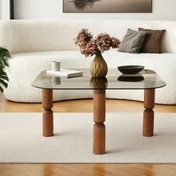Table basse carrée en verre fumé - pieds bois marron sculpté BOMA