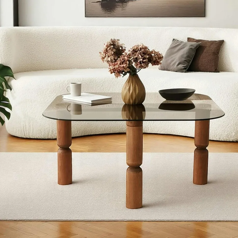 Table basse carrée en verre fumé - pieds bois marron sculpté BOMA