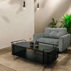 Table basse noire pieds dorés double plateau