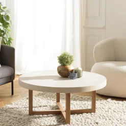 Table basse ronde béton beige pieds bois croisés DIKA