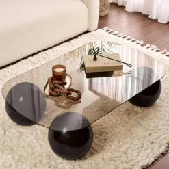 Table basse verre ambré bords arrondis - 4 pieds noirs KOCHI