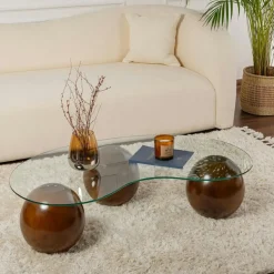 Table basse verre ambré design – 3 pieds boules marrons KOCHI