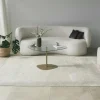 Table basse verre minimaliste forme galet et pied doré TULUM
