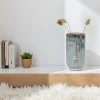 Vase moderne bleu avec motif visage